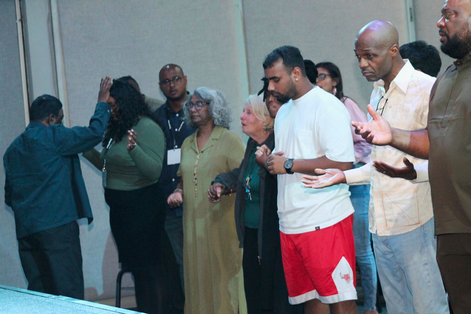 Church family praying together