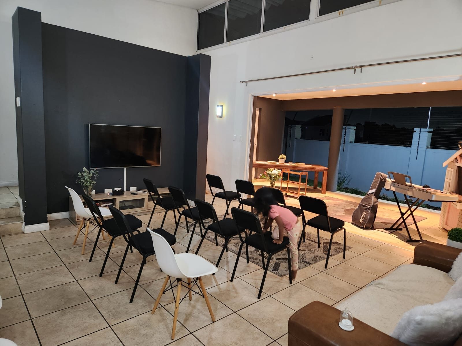 The living room set up for our first service at home