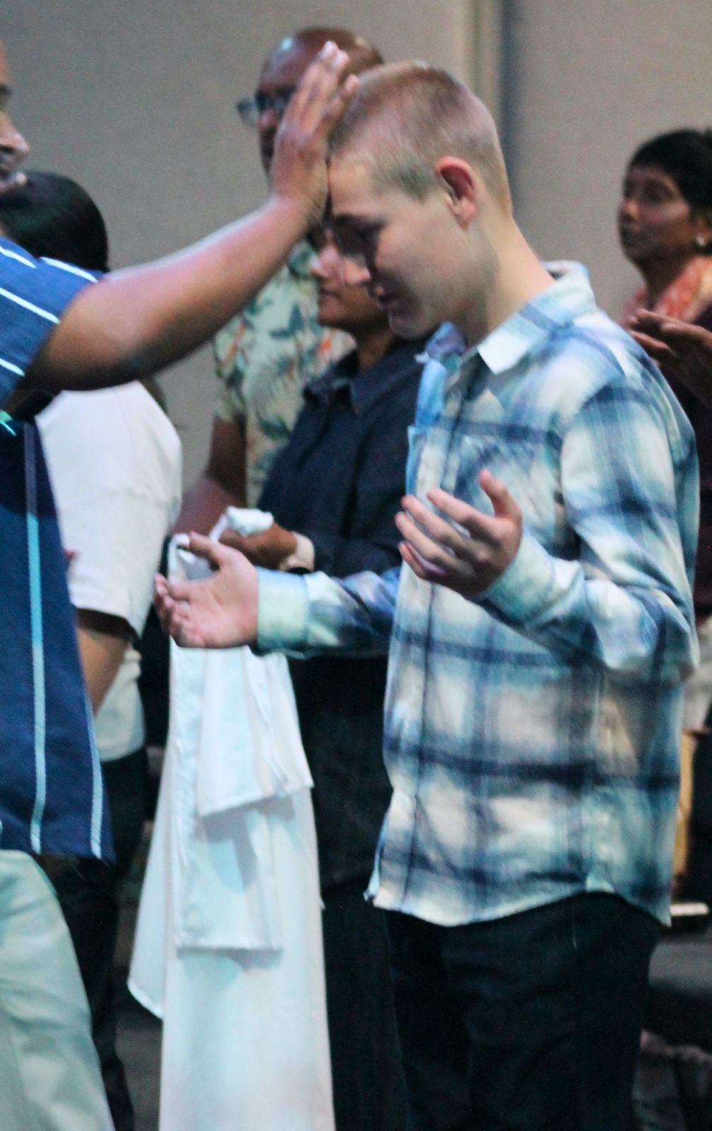 Praying together at Calvary Church